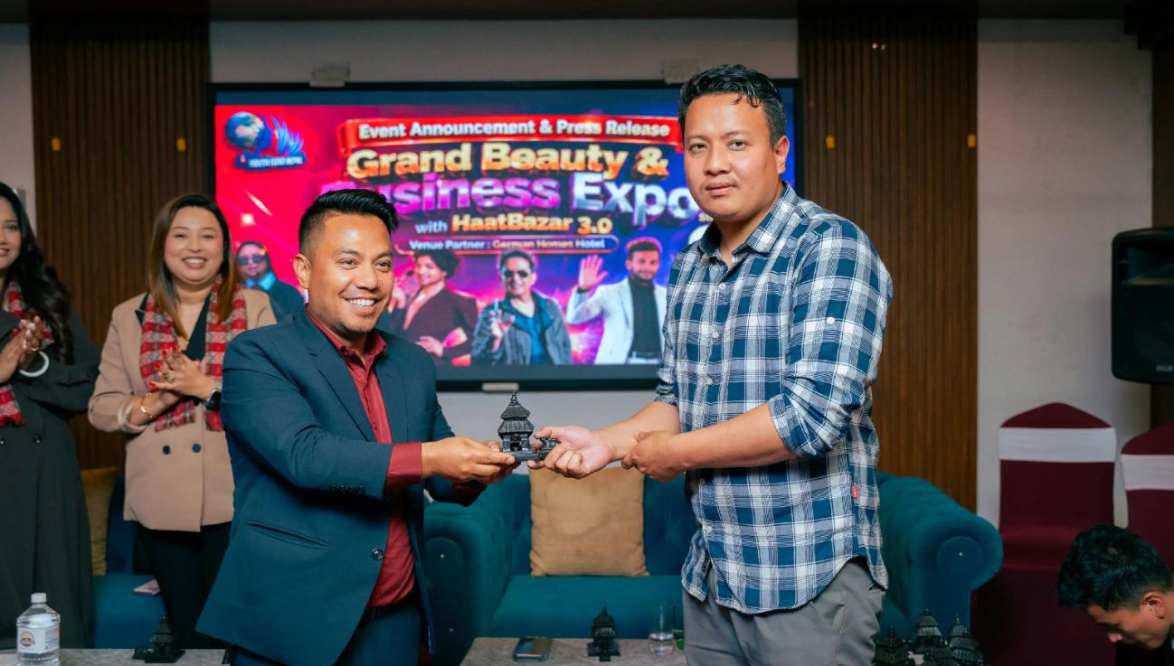 Anjit Lama being recognised at a business expo